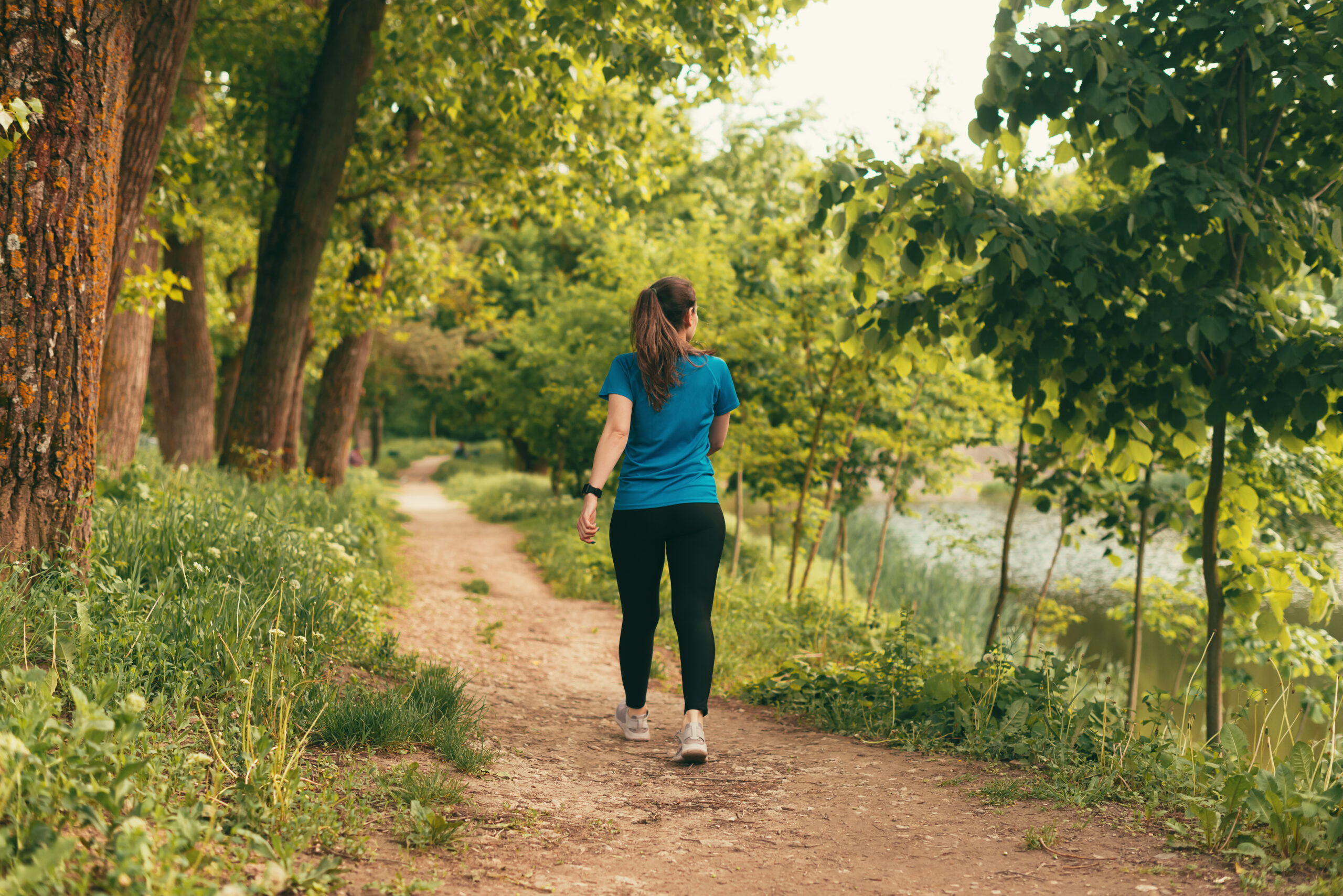 Woman going for a walk outdoors on lunchbreak 