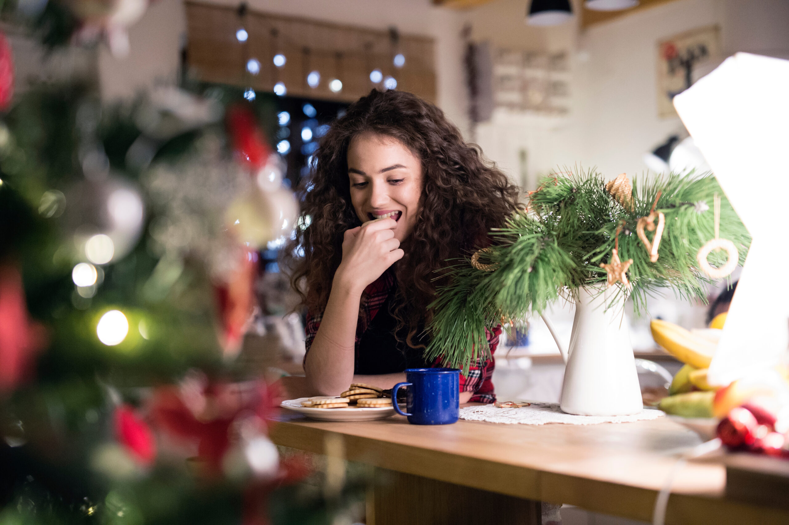 Woman taking mindful moment at Christmas 