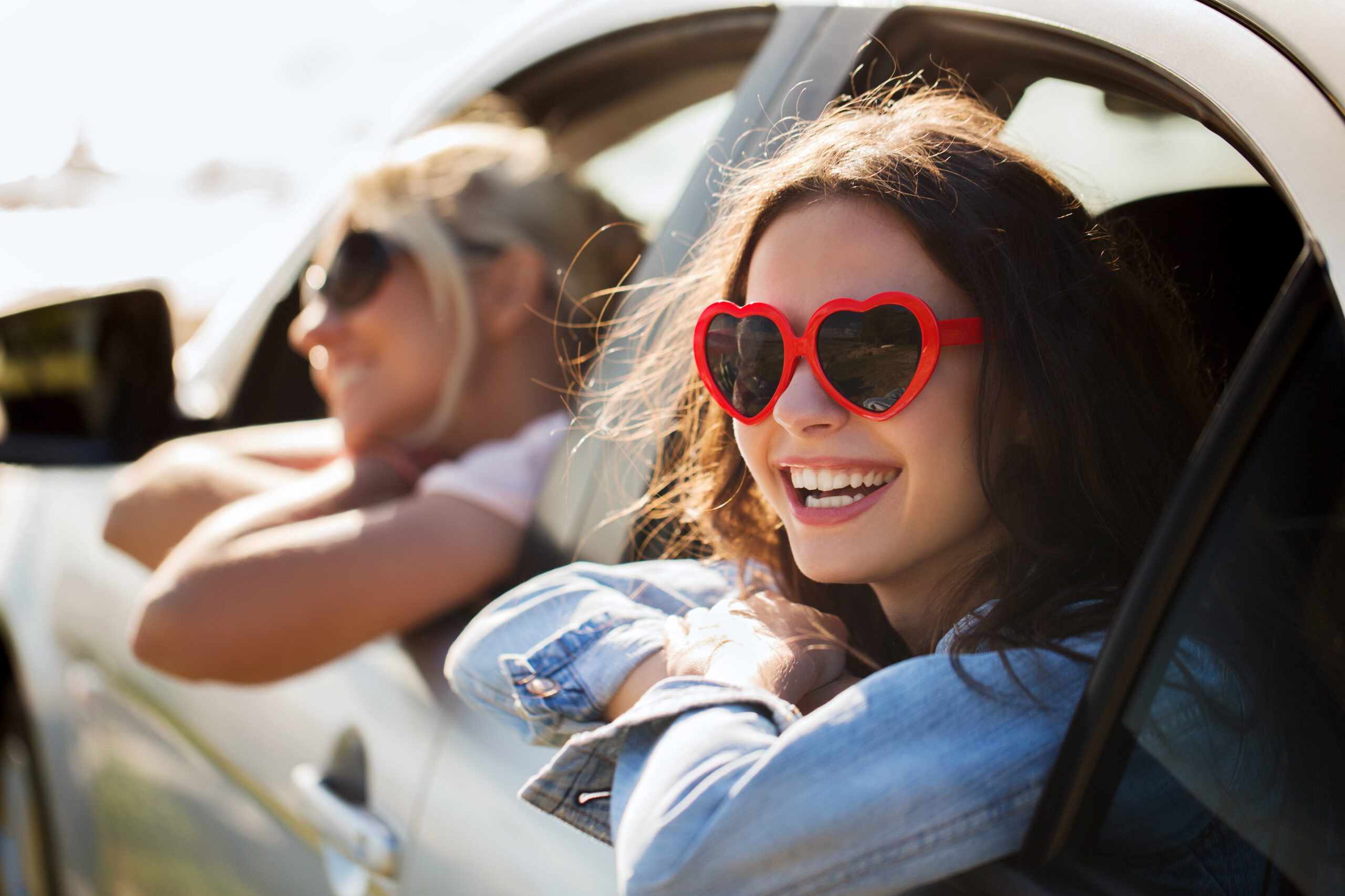 Girl wearing heart sunglasses on Valentines Roadtrip