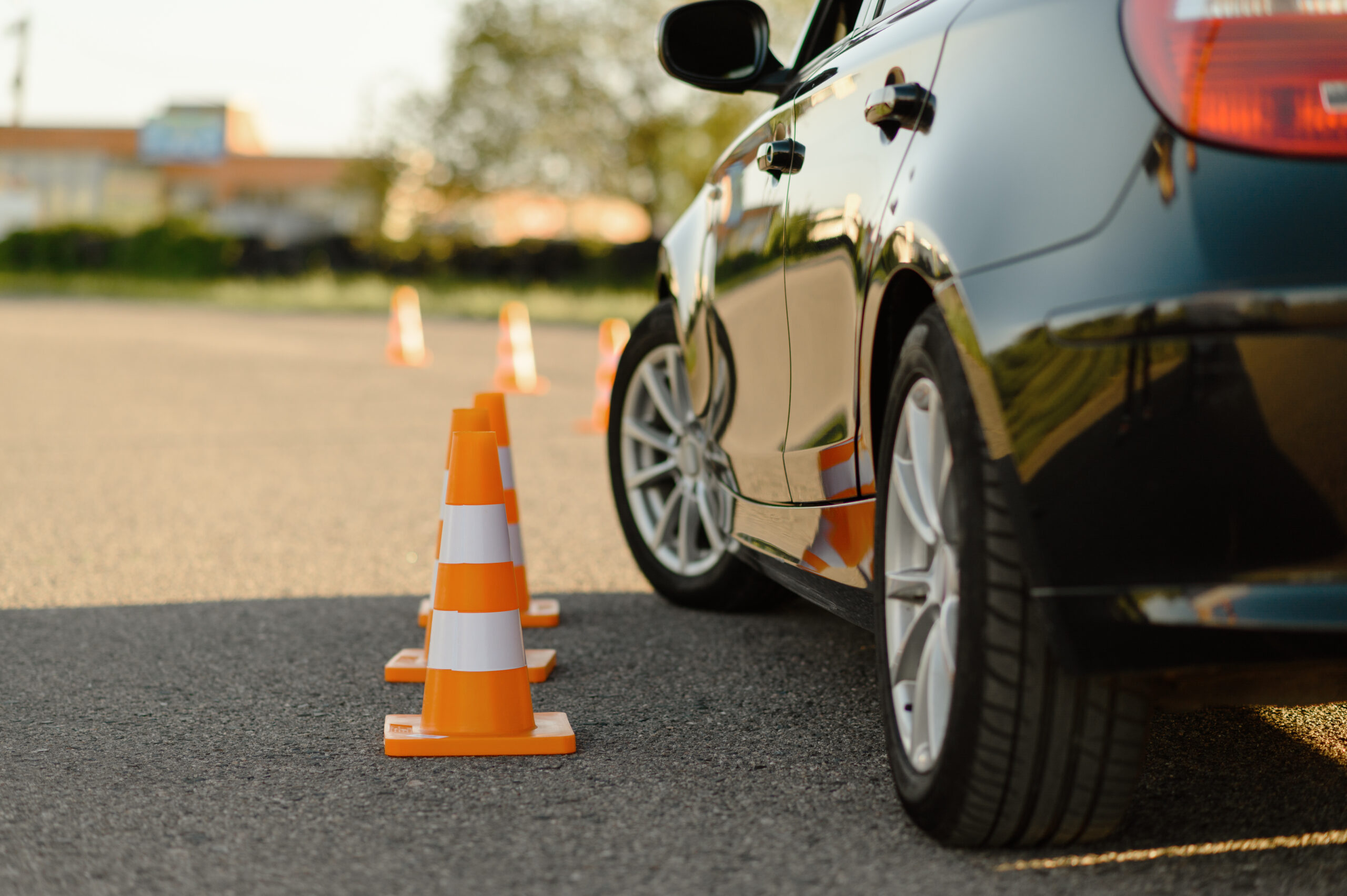 Car parked near cones 