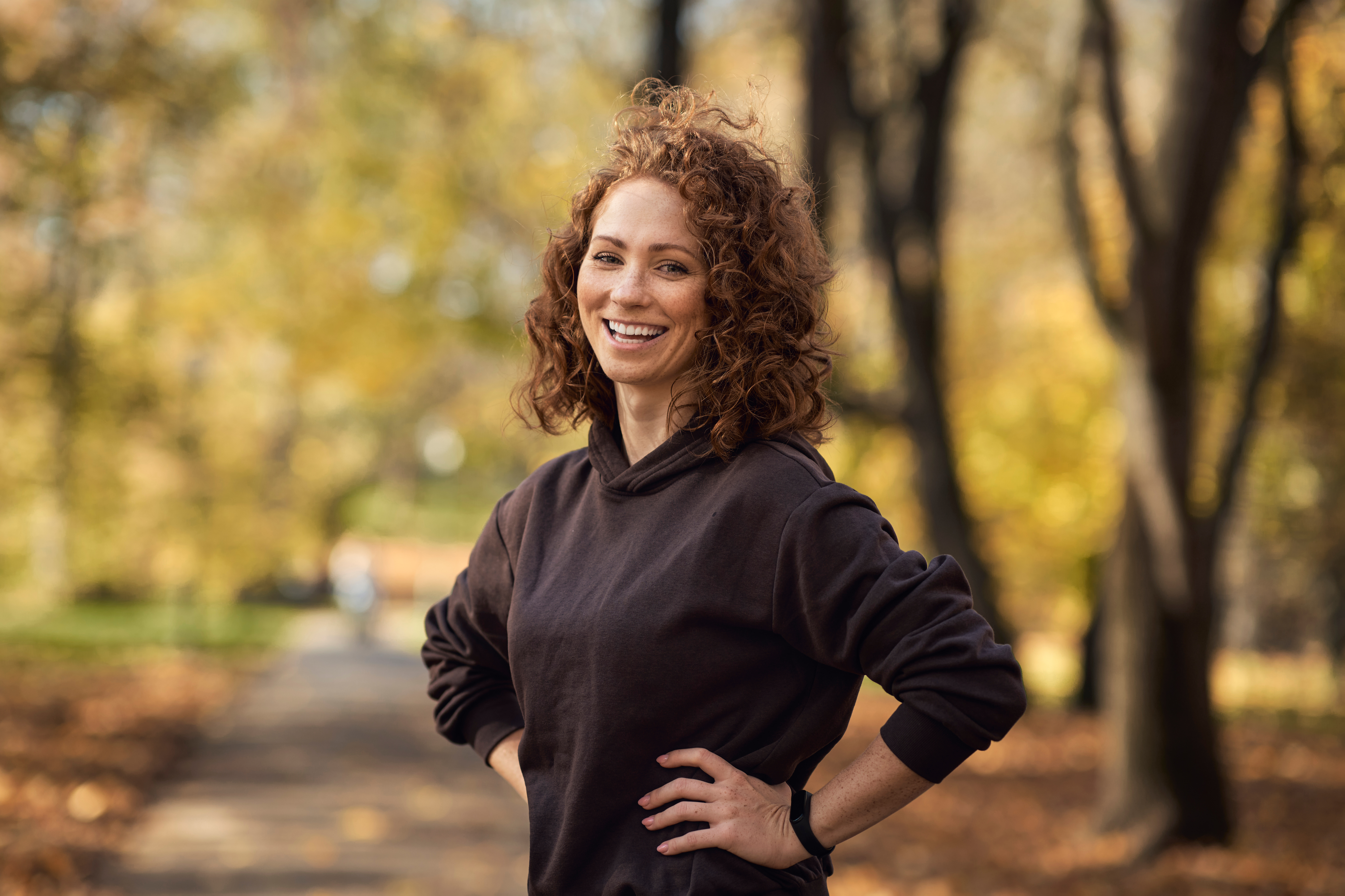Woman exercising in Autumn 